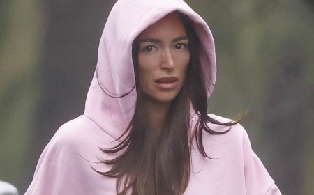 Lachie Neale's new flame Emma Field braves the rain to do a coffee run for the couple ahead of AFL Grand Final clash between Brisbane and Fremantle