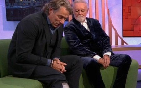 John Bishop makes TV appearance wearing a medical boot as he shares update after breaking his ankle in motorbike crash and cancelling tour