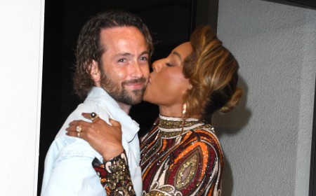 Mel B, 51, plants a kiss on husband Rory McPhee, 38, as she enjoys some backstage PDA at America's Got Talent final