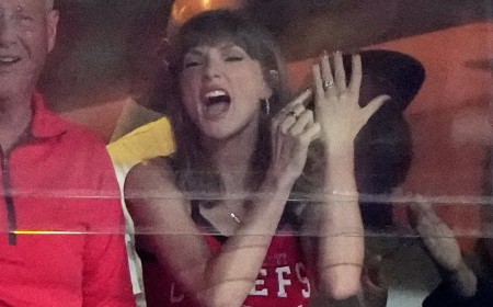 Taylor Swift makes a rare appearance with her mom Andrea as she yells 'that's my husband' and points at her $1million engagement ring as Travis Kelce scores a touchdown