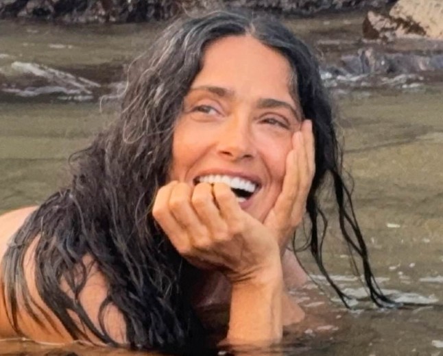 Salma Hayek strips off for a nude swim and says she's 'grateful' as she celebrates her milestone 60th birthday