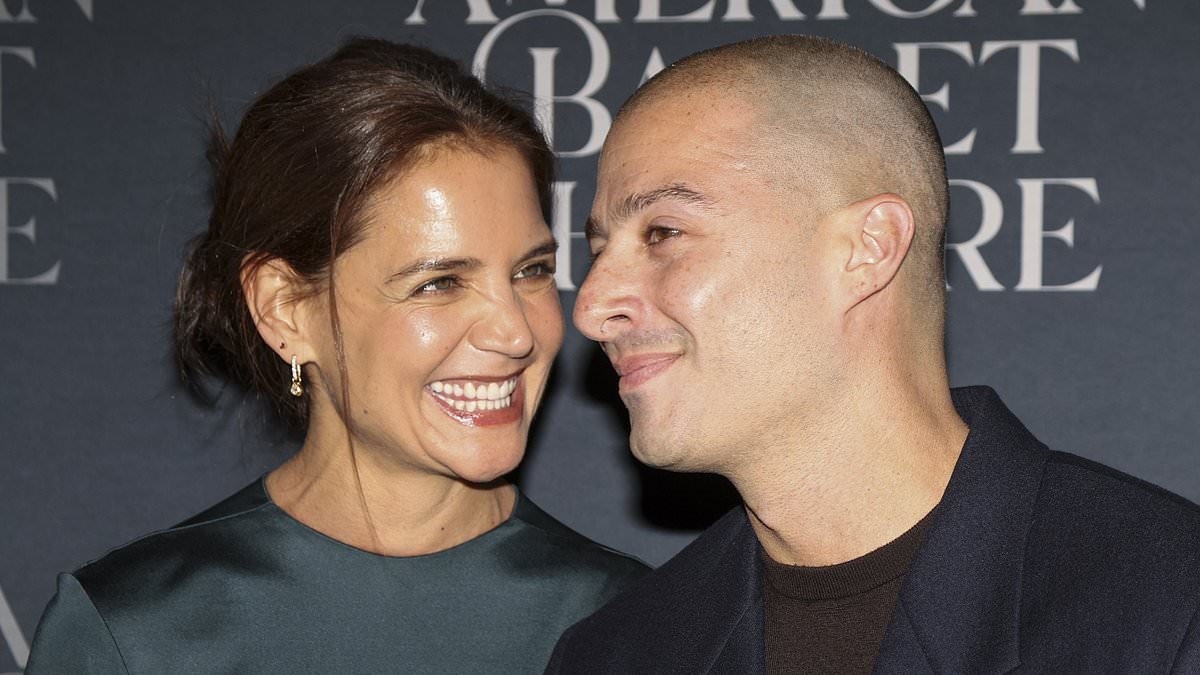Katie Holmes' face says it all as actress, 47, clings to boytoy Jason Bard Yarmosky, 39, on red carpet at American Ballet Theatre's Fall Gala