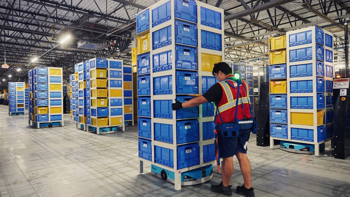 Inside Amazon’s robotic arms race and what it means for the future of human work