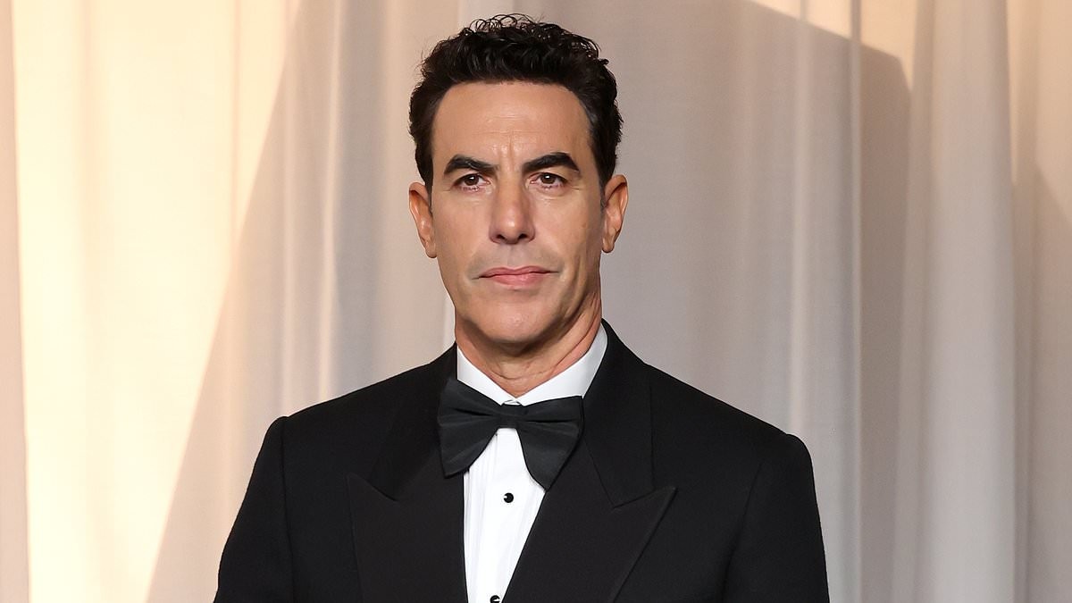 Sacha Baron Cohen swaps Ali G's tracksuit for a tux as he risks run-in with ex Isla Fisher at Academy Museum Gala - amid criticism of controversial character's comeback