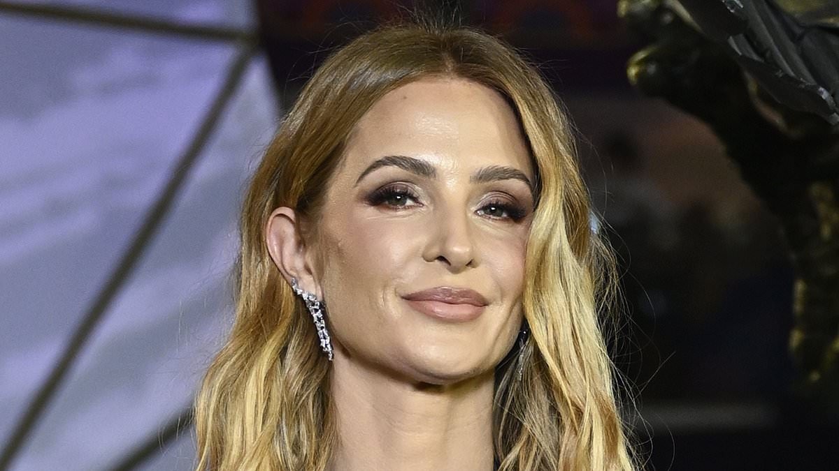 Millie Mackintosh masters 'revenge dressing' in a deeply plunging gown at Hunger Games premiere as she takes aim at Hugo Taylor once again with pointed 'kisses to my exes' post