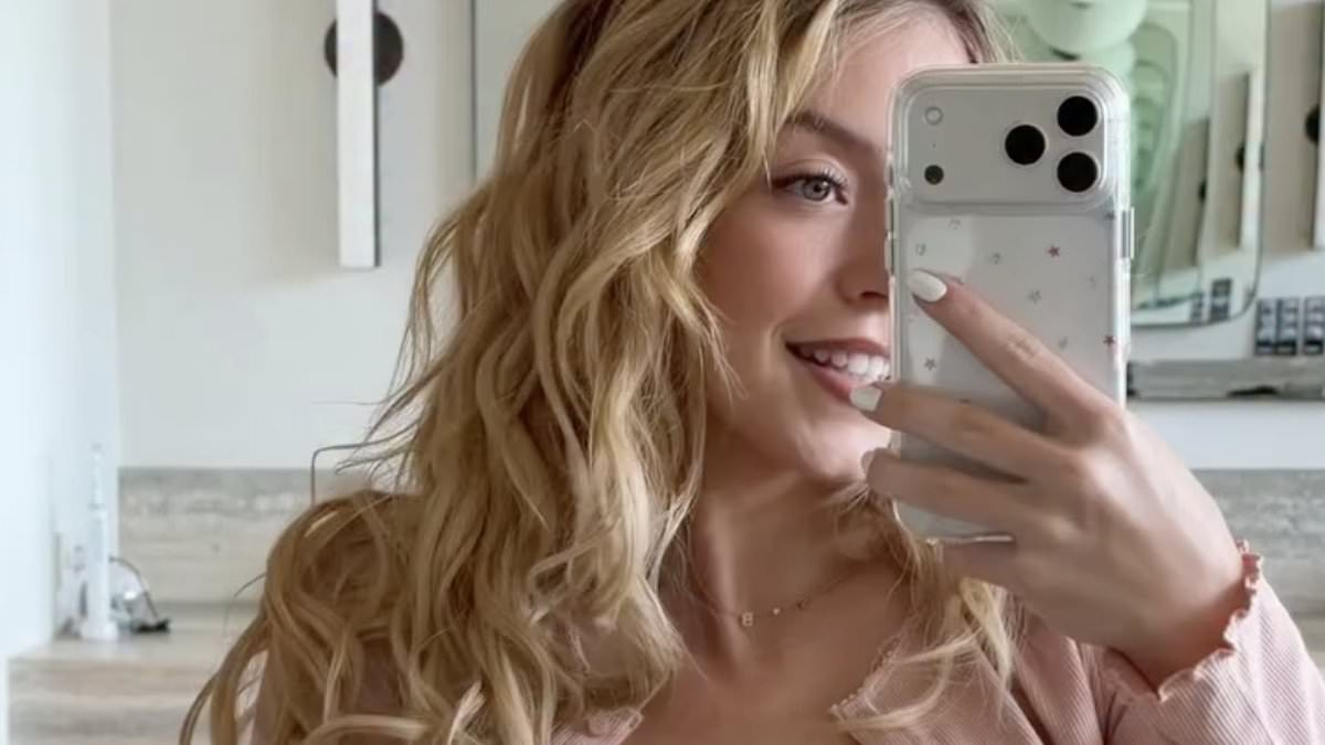 Sydney Sweeney promotes 'nude' lingerie line as she spills out of lacy bra in jaw-dropping video