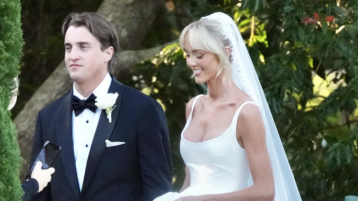 Annie Knight criticised for wearing a white wedding dress and a veil as she ties the knot with fiancé Henry Brayshaw: 'Scarlet would have been more appropriate'