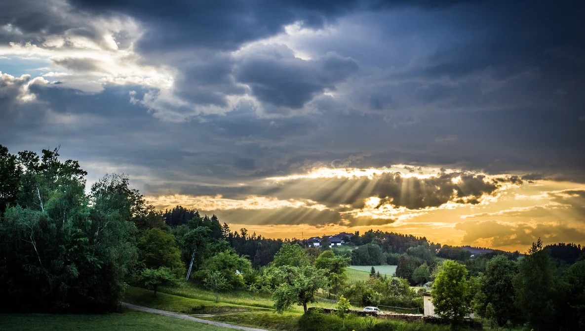 Crepuscular Rays: Why These Beautiful Beams Happen and How to Be Standing There