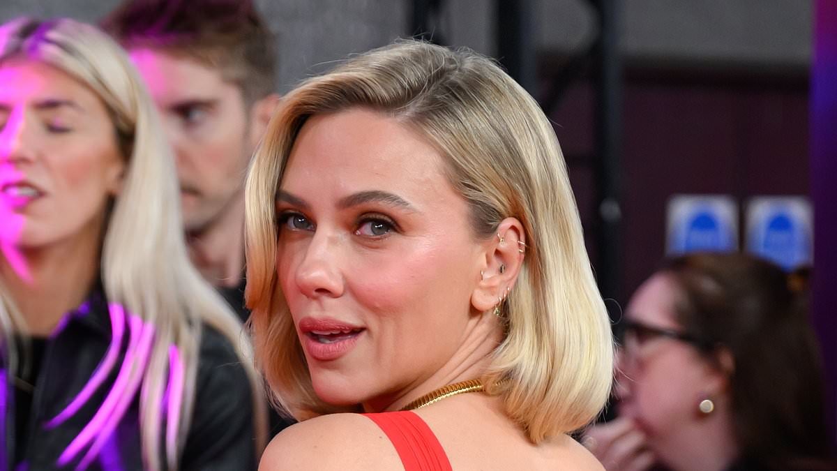 Scarlett Johansson shows off her huge back tattoo as she wows in a plunging red dress at BFI London Film Festival premiere of Paper Tiger