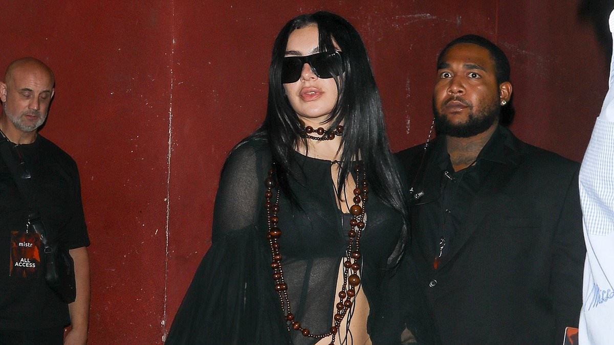 Charli XCX wows in a lace bra and barely-there hotpants as she hits the red carpet at star-studded Hollywood party