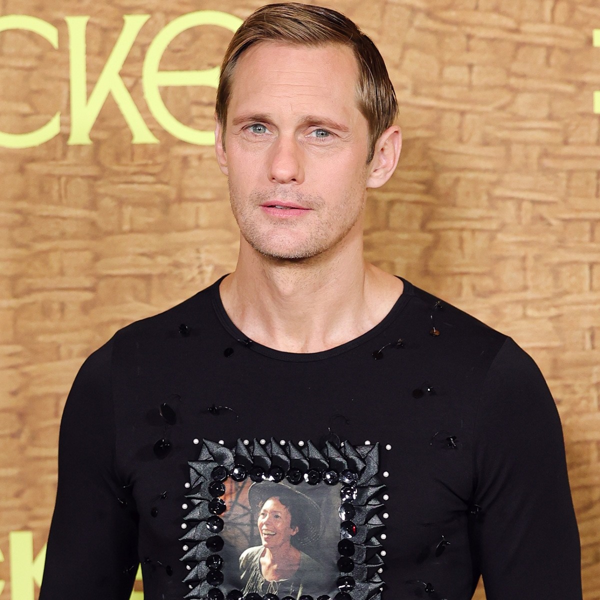 Alexander Skarsgård Weaves Olivia Colman’s Face Into Red Carpet Look