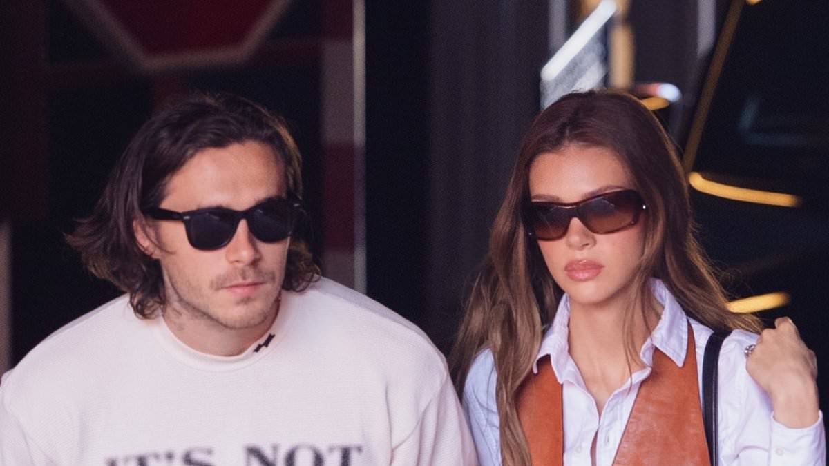 Brooklyn Beckham shares a poignant message as he steps out in Paris wearing an 'it's not clocking to you' slogan tee after snubbing Victoria's show