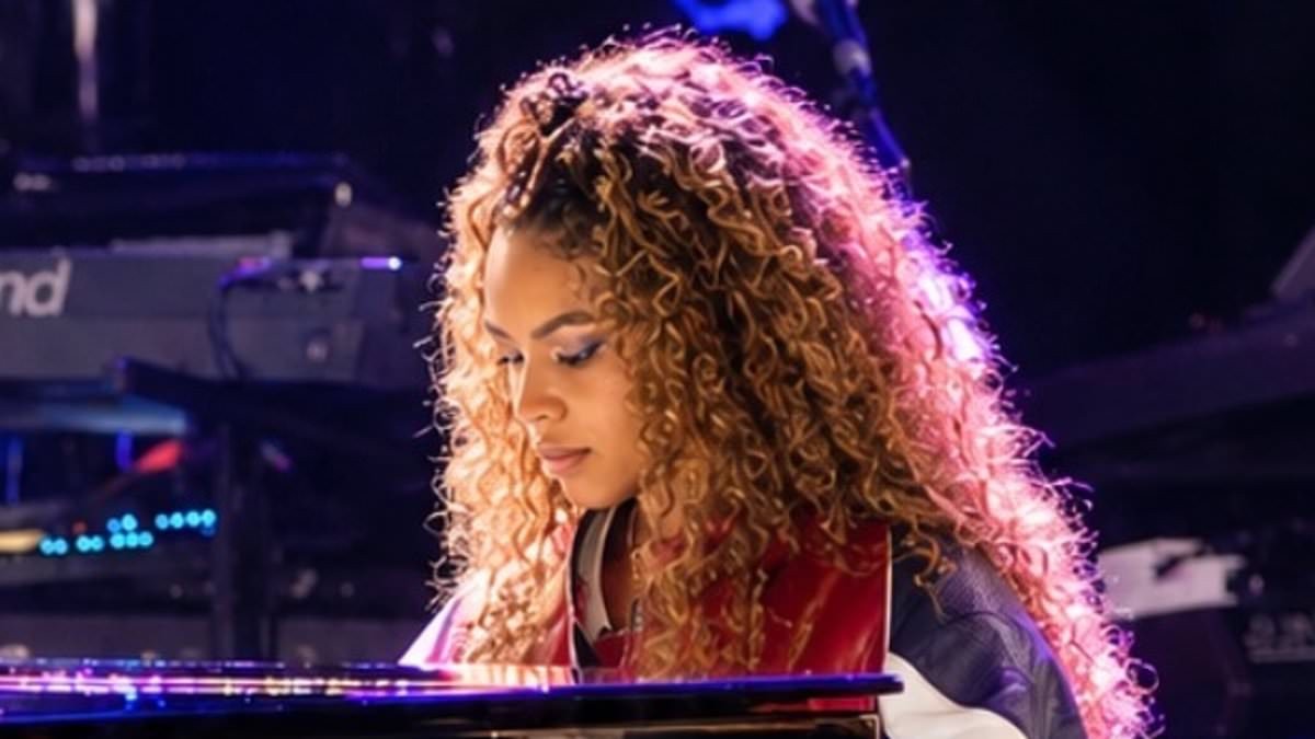 Beyonce's look-alike daughter Blue Ivy, 14, shows off her musical prowess on stage with dad Jay-Z at sold-out LA concert