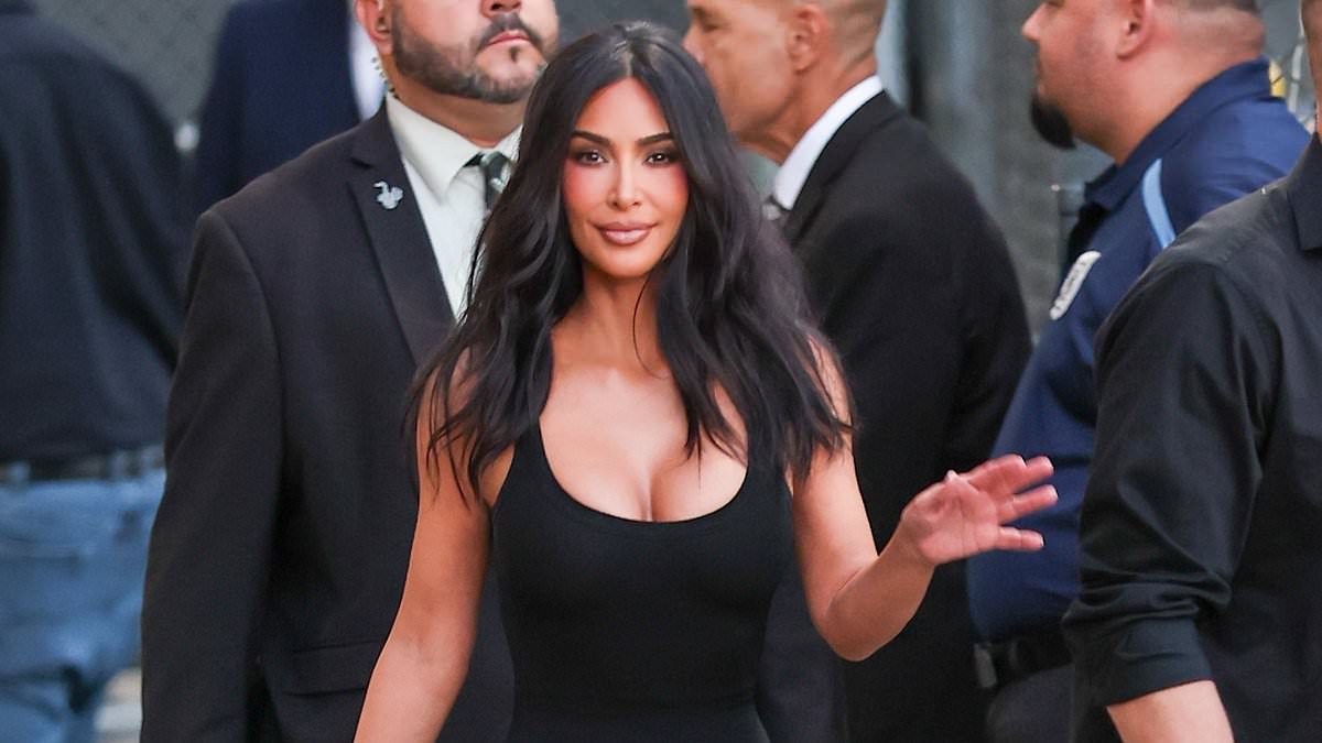 Kim Kardashian sizzles in plunging black dress at Jimmy Kimmel taping as she confesses to spying on OJ Simpson