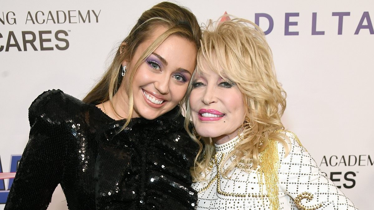 Miley Cyrus brings sold-out LA concert to a standstill as she breaks down in tears paying tribute to late godmother Dolly Parton: 'Me and Dolly, we are eternal'