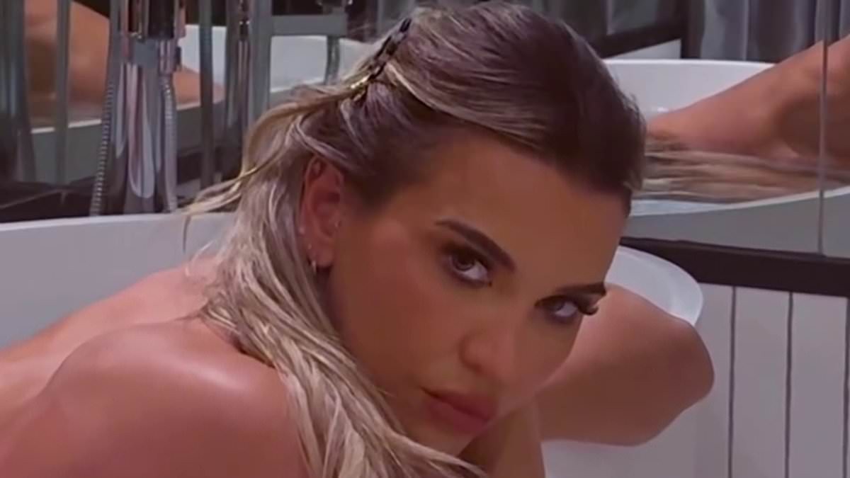 Christine McGuinness poses nude in the bath as she declares she's 'unapologetic and unavailable' while enjoying a luxurious solo hotel stay