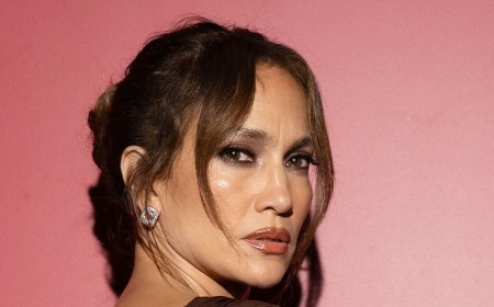 Jennifer Lopez, 57, stuns in a backless gown with a soaring split as she attends Naked Heart France charity dinner
