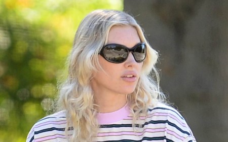 Elsa Hosk ditches runway glam for oversized t-shirt and jeans on LA outing with her daughters... after fans roasted her Victoria's Secret walk