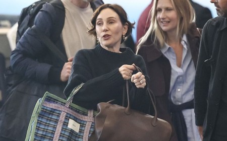 Zoë Foster Blake and husband Hamish cut casual figures as they jet out of NYC after partying at Andy Lee and Rebecca Harding's wedding