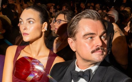 Leonardo DiCaprio tries to stay under the radar as he and girlfriend Vittoria Ceretti party with Lenny Kravitz