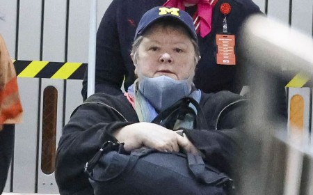 Magda Szubanski arrives at Sydney Airport in a wheelchair and wearing mask after revealing that her rare cancer is 'incurable'
