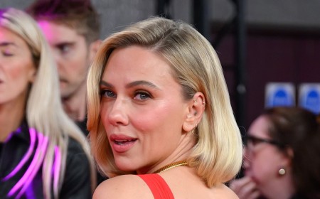Scarlett Johansson shows off her huge back tattoo as she wows in a plunging red dress at BFI London Film Festival premiere of Paper Tiger