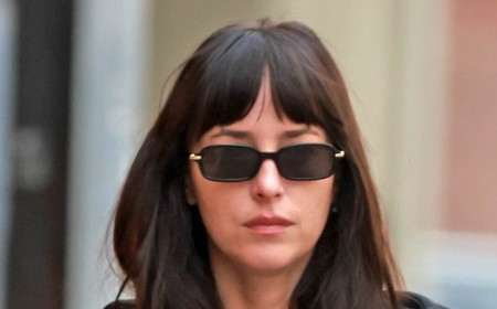 Dakota Johnson flashes her toned abs at the gym in LA... following steamy sex revelation amid MGK romance