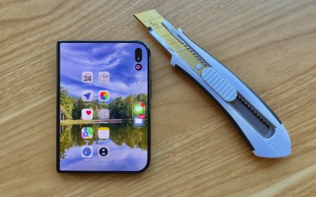 Man Destroys $2,000 iPhone Duo With Dirt, Fire, Knives and Medieval Chainmail