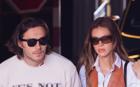 Brooklyn Beckham shares a poignant message as he steps out in Paris wearing an 'it's not clocking to you' slogan tee after snubbing Victoria's show