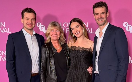 Lily James makes a rare appearance with her mother and 'very handsome brothers' at the London Film Festival