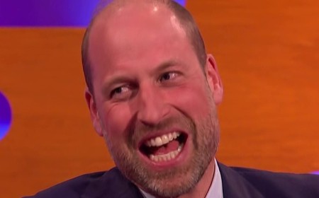 Prince William jokes he tried to move Taylor Swift's husband Travis Kelce out of viral snap with George and Charlotte as he recalls meeting the singer at her 2024 show