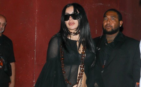 Charli XCX wows in a lace bra and barely-there hotpants as she hits the red carpet at star-studded Hollywood party