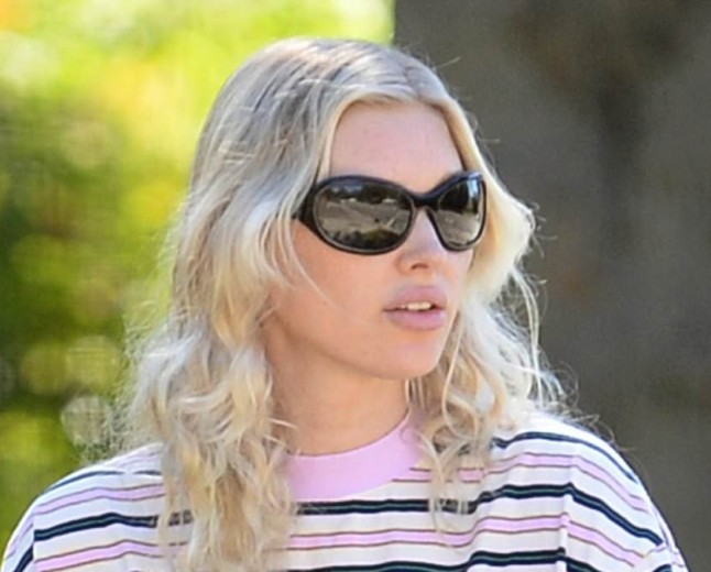 Elsa Hosk ditches runway glam for oversized t-shirt and jeans on LA outing with her daughters... after fans roasted her Victoria's Secret walk