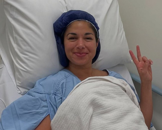 Home and Away star Sarah Roberts is rushed to hospital to undergo surgery as her boyfriend flies home from Canada to help her walk